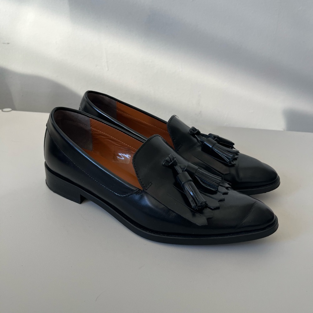 Black leather loafers